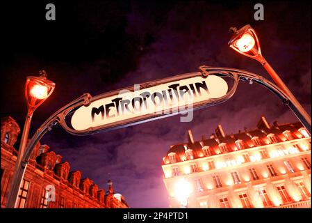 Sign of a metro-subway- station in Paris, France by night. vvbvanbree fotografie. Stock Photo