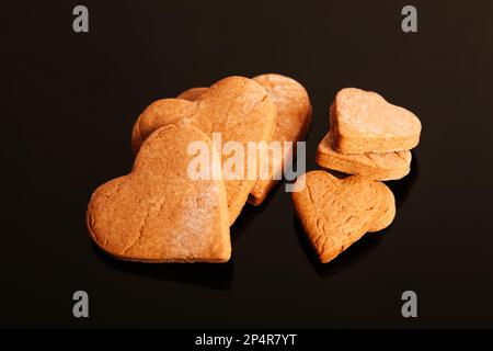 Valentine Home made ginger bread biscuits in heart shapes shaped for valentine's day Stock Photo