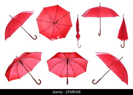 Set with stylish red umbrellas on white background Stock Photo