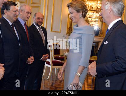 Belgium's King Philippe, right, and Queen Mathilde, second right, talk with with European Commission President Jose Manuel Barroso, left, European Parliament President Martin Schulz, center, and European Council President Herman Van Rompuy, second left, during a New Year's reception at the Royal Palace in Brussels, Friday, Jan. 10, 2014. Belgium's King Philippe invited EU officials from all the EU institutions in Brussels for the annual New Year's reception. (AP Photo/Eric Lalmand, pool)