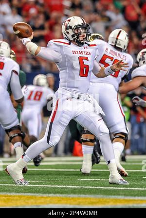 November 16, 2013: .Texas Tech Red Raiders wide receiver Jakeem Grant (11)  catches a pass as he is tackled by Baylor Bears defensive back Sam Holl  (25). during the Texas Farmer Bureau