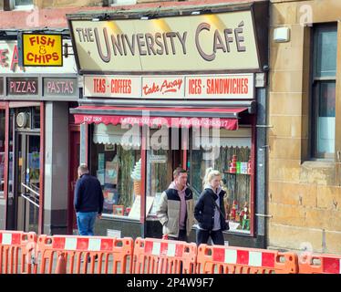 Glasgow, Scotland, UK 6th March, 2023. UK Weather:  Sunny start saw happier locals as the streets filled in the spring weather before the forecast return of winter. The famous university cafe on byres road a popular destination for ice cream lovers suffers from the roadworks blighting the city  in the sun. Credit Gerard Ferry/Alamy Live News Stock Photo