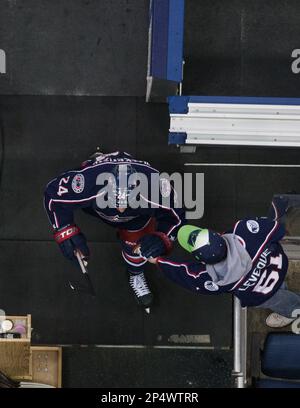 Dec. 10 2013 Columbus OH United States of America Columbus Blue Jackets center Derek MacKenzie 24 high fives a fan during warmups prior to the NHL game between the New