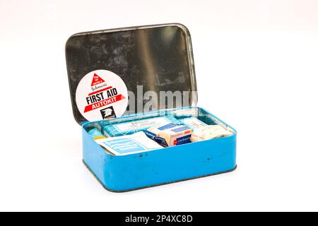 1960s metal tin containing johnson's vintage first aid kit for travel or car use Stock Photo