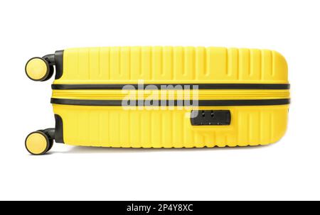 Yellow plastic suitcase isolated on white background. Stock Photo