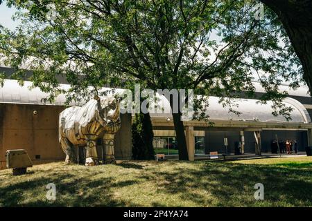 London, Ontario, Canada - Sep 2022 Aluminum sculpture of a white rhino by artist Tom Benner in front of Museum London. Stock Photo