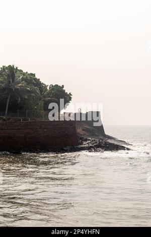 Candolim, Goa, India - January 2023: A view of Portuguese era Fort Aguada beside the sea in the village of Sinquerim in North Goa. Stock Photo