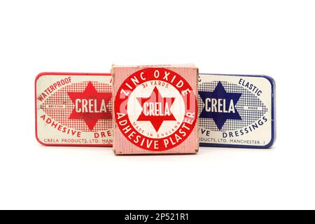 vintage tins and box containing Crela adhesive plasters and dressings from first aid kit Stock Photo