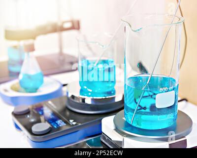 Flasks and magnetic stirrer with heating Stock Photo