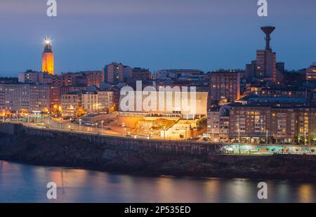 view of the city in Ensenada del Orzan,Tower of Hercules, Roman lighthouse, Casa del Hombre, Museo Domus, The mankind Museum by Arata Isozaki, and  wa Stock Photo