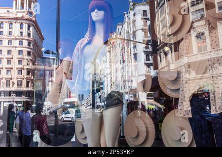 Reflections in a shop window, Gran Via street. Madrid, Spain Stock Photo