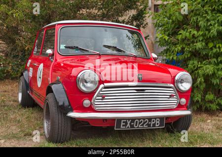 Lamorlaye, France - July 05 2020: The Mini is a small economy car produced since 1959 by the English-based British Motor Corporation (BMC) and its suc Stock Photo