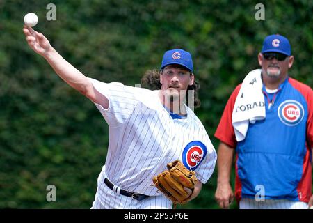 Chicago Cubs starting pitcher Jeff Samardzija delivers during the first  inning of the Wrigley Field 100th anniversary game against the Arizona  Diamondbacks at Wrigley Field on April 23, 2014 in Chicago. The