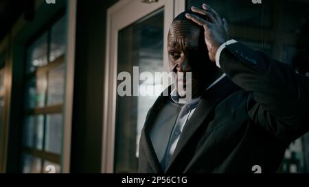 Unhealthy sick mature african american man feel headache holding head suffering from chill talking about feeling unwell frustrated ill adult Stock Photo
