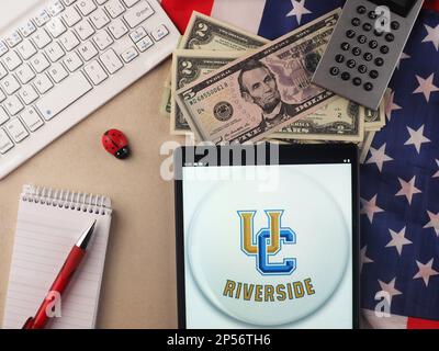 In this photo illustration, University of California, Riverside (UCR)  logo seen displayed on a tablet. Stock Photo