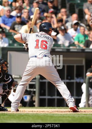 Atlanta Braves Jeff Francoeur (L) high-fives with teammate Brian McCann  after Francoeur's two-run homer in the sixth inning drove in McCann during  play against the visiting New York Mets at Turner Field