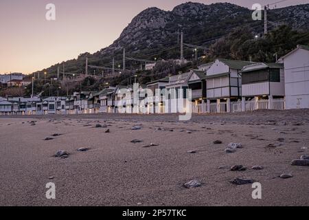 'Les Casetes del Garraf' (The Little Houses of the Garraf), typical white and green houses overlooking the Garraf beach, Catalonia, Spain.  An example Stock Photo