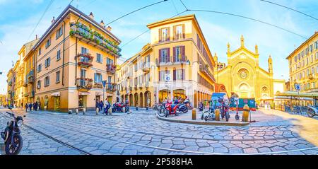 MILAN, ITALY - APRIL 11, 2022: Panorama of Piazza del Carmine with residential houses and Church of Carmine, on April 11 in Milan, Italy Stock Photo