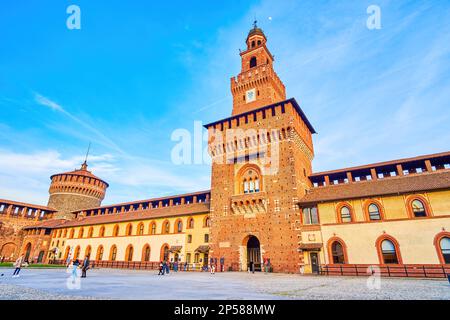 MILAN, ITALY - APRIL 11, 2022: Torre del Filarete, the most known and the main entrance to Sforza's Castle, on April 11 in Milan, Italy Stock Photo