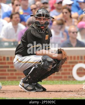 Pittsburgh Pirates' Russell Martin (55) gets a facefull of cream in  celebration from Pittsburgh Pirates' A.J. Burnett after Martin drove in  Gaby Sanchez with the game winning hit in the fourteenth inning