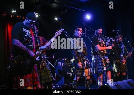 Piper, Aspy Luison, bagpipes, The Real McKenzies, Canadian Celtic punk band  in concert Stock Photo - Alamy