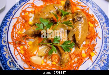 Perdiz en escabeche,Pickled Partridge,Venta del Quijote,famous typical restaurant ,traditional cuisine,Puerto Lapice, province of Ciudad Real, Cas Stock Photo