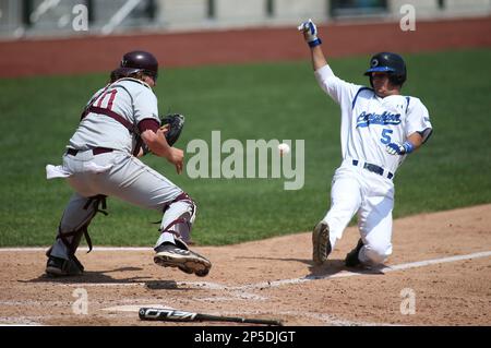 Luke Voit (30) of the Missouri State Bears follows through his swing during  a game against the Evansville Purple Aces at Hammons Field on May 12, 2012  in Springfield, Missouri. (David Welker/Four