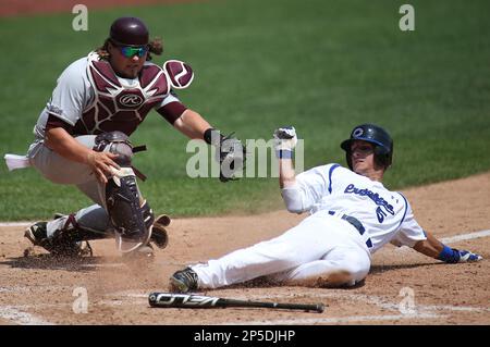 Luke Voit #30 of the Missouri State Bears follows through his swing after  making contact on a pitch during a game against the Wichita State Shockers  at Hammons Field on May 5