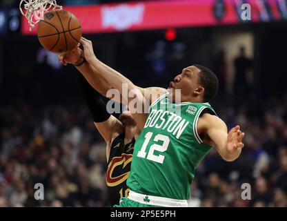 Cleveland, United States. 06th Mar, 2023. Boston Celtics forward Grant Williams (12) grabs a rebound over Cleveland Cavaliers forward Cedi Osman (16) at Rocket Mortgage FieldHouse in Cleveland, Ohio on Monday, March 6, 2023. Photo by Aaron Josefczyk/UPI Credit: UPI/Alamy Live News Stock Photo