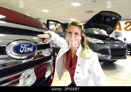 In an April 11, 2013 photo, Laurie Moses, salesperson at Suburban