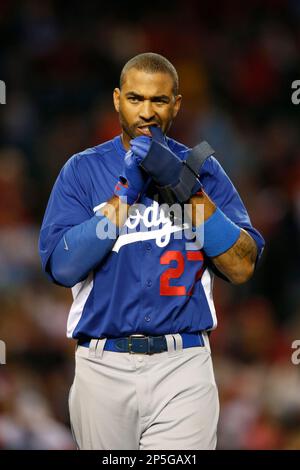 Los Angeles Dodgers' Matt Kemp, center, stands on crutches with teammates  during a rally after the Dodgers' baseball game against the Colorado  Rockies, Sunday, Sept. 29, 2013, in Los Angeles. Kemp is