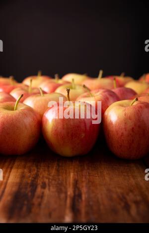 Several Royal Gala Apples (malus domestica). Apple trees are cultivated worldwide and are the most widely used species of the genus Malus. Stock Photo