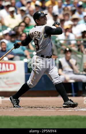 MILWAUKEE - APRIL 19: Jose Bautista #19 of the Pittsburgh Pirates follows  through on his swing against the Milwaukee Brewers on April 19, 2007 at  Miller Park in Milwaukee, Wisconsin. The Brewers