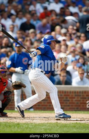 St. Louis Cardinals' outfielder Jim Edmonds played first base Sunday for  the injured Albert Pujols (not pictured). Edmonds calls for a pop up by the  Chicago Cubs' pinch hitter Phil Nevin to