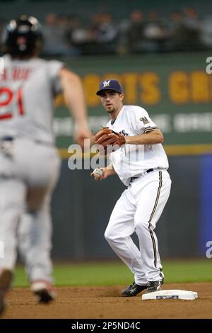 Milwaukee Brewers J.J. Hardy gets a fist with thumbs up from first base  coach Eddie Sedar after hitting a two run RBI single off of St. Louis  Cardinals pitcher Todd Wellemeyer in