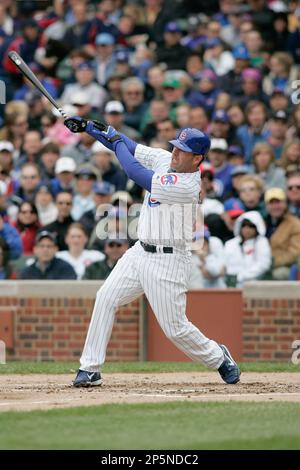 St. Louis Cardinals' outfielder Jim Edmonds played first base Sunday for  the injured Albert Pujols (not pictured). Edmonds calls for a pop up by the  Chicago Cubs' pinch hitter Phil Nevin to