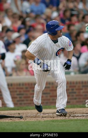 CHICAGO, IL - MAY 15: Outfielder Jim Edmonds #15 of the Chicago Cubs  follows through on his swing against the San Diego Padres at Wrigley Field  on May 15, 2008 in Chicago