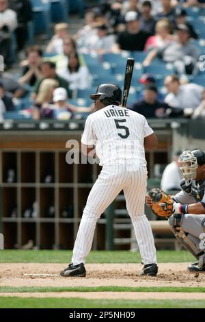 CHICAGO - APRIL 6: Juan Uribe #5 of the Chicago White Sox starts to run to  first base after a hit against the Cleveland Indians at U.S. Cellular Field  on April 6