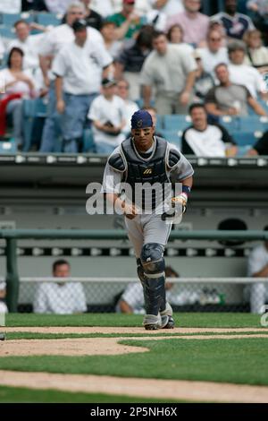 CHICAGO - APRIL 6: Catcher Victor Martinez #41 of the Cleveland Indians  follows through on his swing against the Chicago White Sox at U.S. Cellular  Field on April 6, 2005 in Chicago