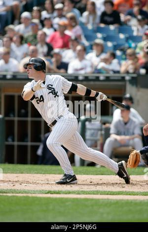 CHICAGO - APRIL 16: Third baseman Joe Crede #24 of the Chicago White Sox  runs to first base during the game against the Seattle Mariners at U.S.  Cellular Field on April 16