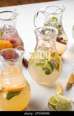 Jars of assorted variety of fresh fruit lemonades Stock Photo