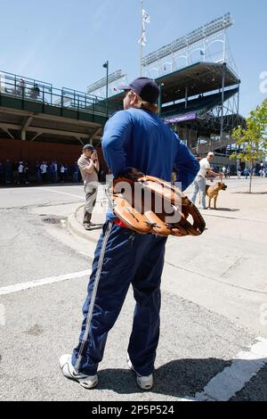 Patrick Butcher, a 38-year-old Chicagoan, waits outside Wrigley Field for  bleacher seats before the Cubs Reds game in Chicago, Monday, Sept. 17,  2007. Butcher worries some fan might play a role in