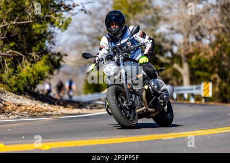 The festival security on a motorcycle during the Cedar Hill Race Festival Stock Photo