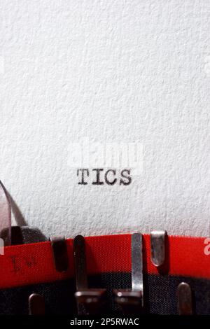 Tics word written with a typewriter. Stock Photo