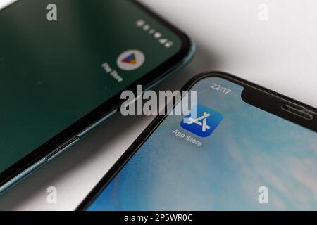 Google play store and Apple app store on Android and Apple Iphone smartphones. . High quality photo Stock Photo