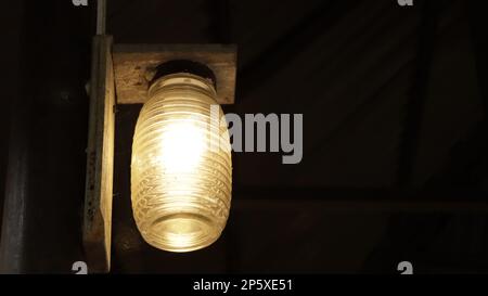 RECYCLED BOTTLE LAMP HANGING IDEA Stock Photo
