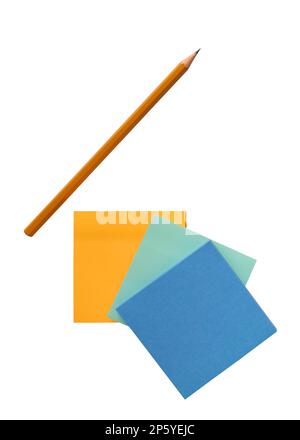 A simple pencil and colorful paper notes isolated on a white background close up Stock Photo