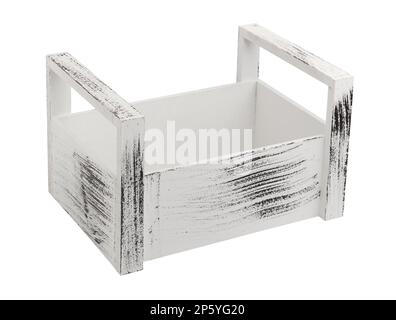 Decorative white wooden storage box with handles for small housewares isolated on white background, close up Stock Photo