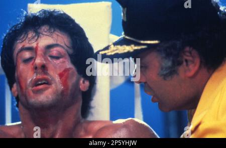 ROCKY III 1982 MGM/UA Entertainment Co. film with Sylvester Stallone at left and Burt Young Stock Photo