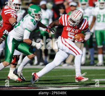 September 03 2016: Quarterback Joe Burrow (10) of the Ohio State Buckeyes  hands the ball off to running back Demario McCall (30) of the Ohio State  Buckeyes during the game between the